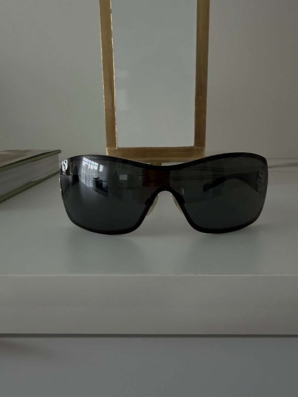 Chanel 4164-B vintage Camellia crystal shield sunglasses.